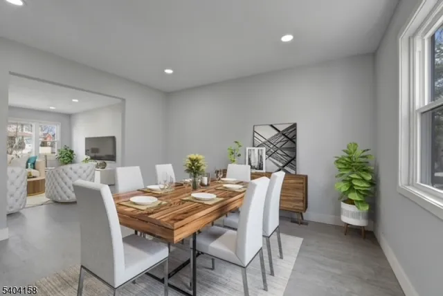 a spacious bedroom with a large bed and a couch