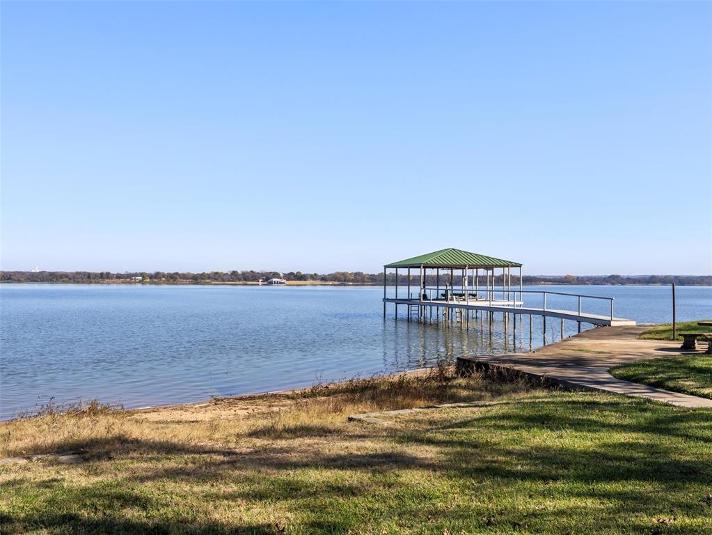 13030 Miller Road Azle, TX 76020 - Photo 2 of 38 Sprawling lawn leading to the dock and water.