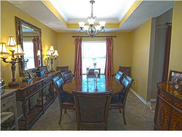 3927 Mesa Road Destin, FL 32541 - Photo 5 of 16 a dining room with furniture and window