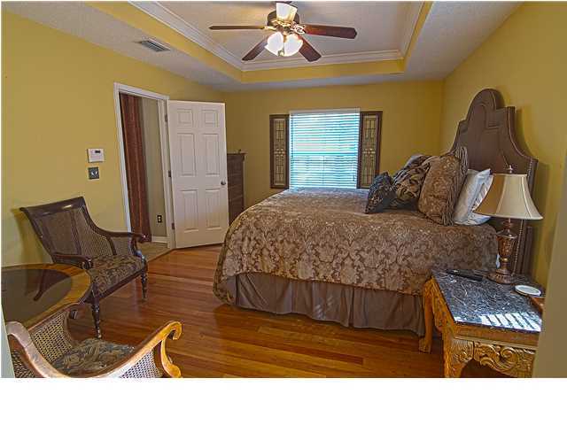 3927 Mesa Road Destin, FL 32541 - Photo 6 of 16 a living room with a bed furniture and a window