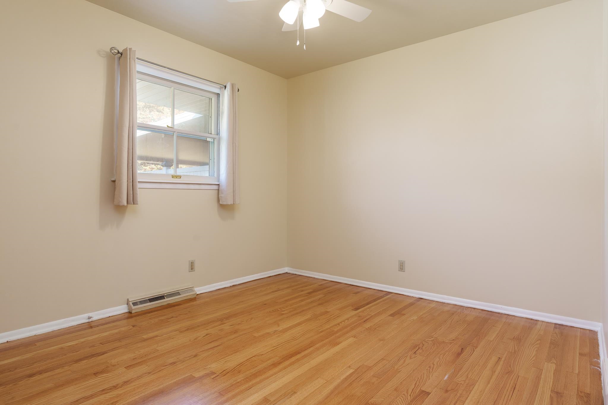 3332 Wesleyan Avenue Rockford, IL 61108 - Photo 14 of 45 wooden floor in an empty room