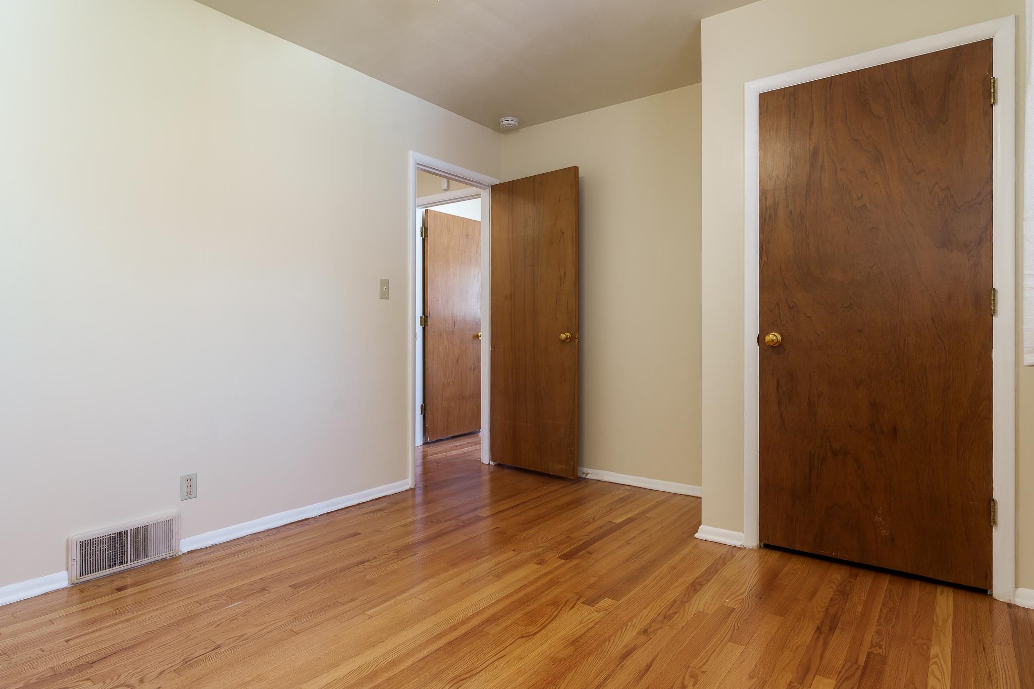 3332 Wesleyan Avenue Rockford, IL 61108 - Photo 15 of 45 a view of an empty room with wooden floor and closet