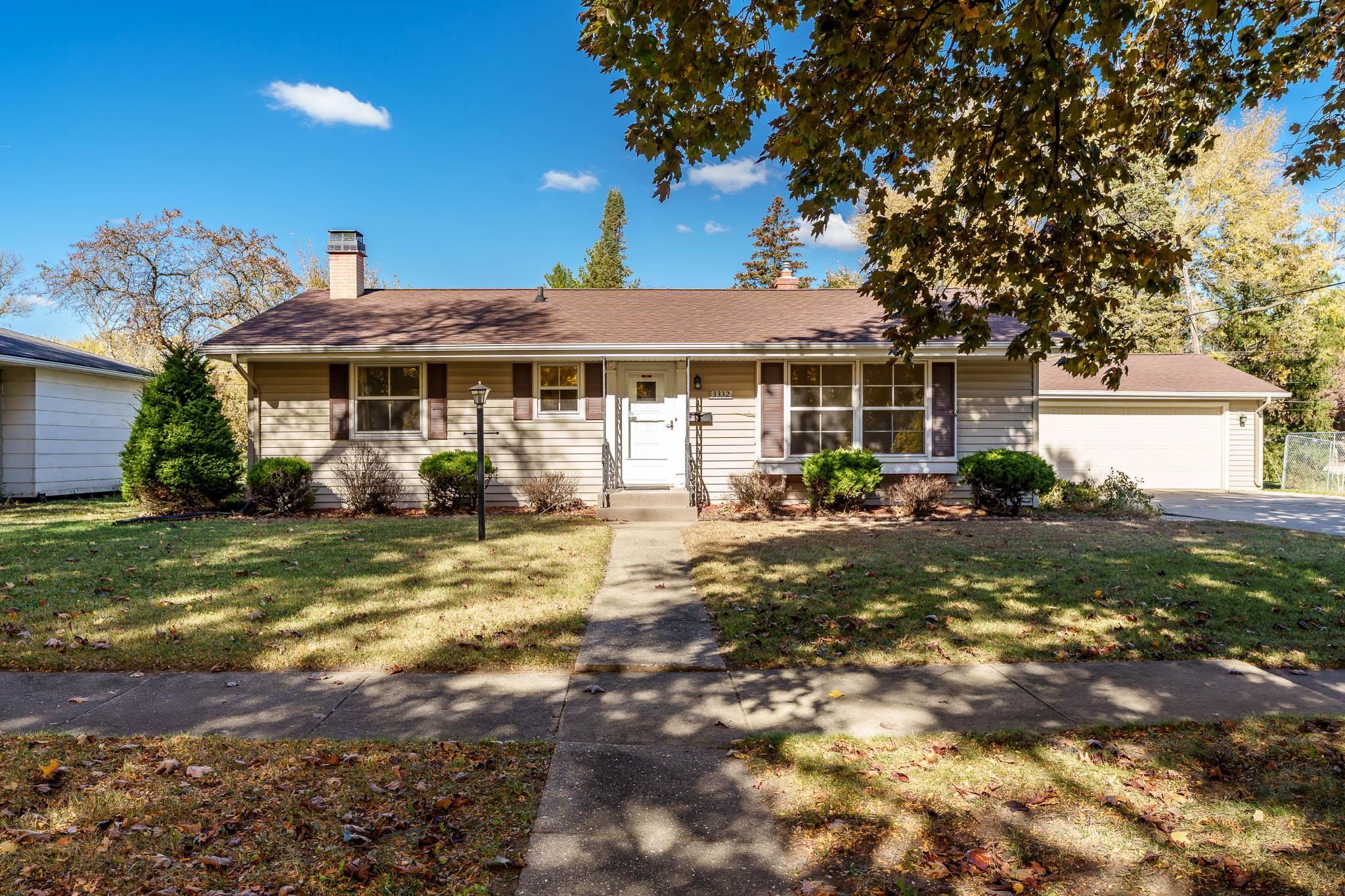 3332 Wesleyan Avenue Rockford, IL 61108 - Photo 2 of 45 a view of a house with a yard