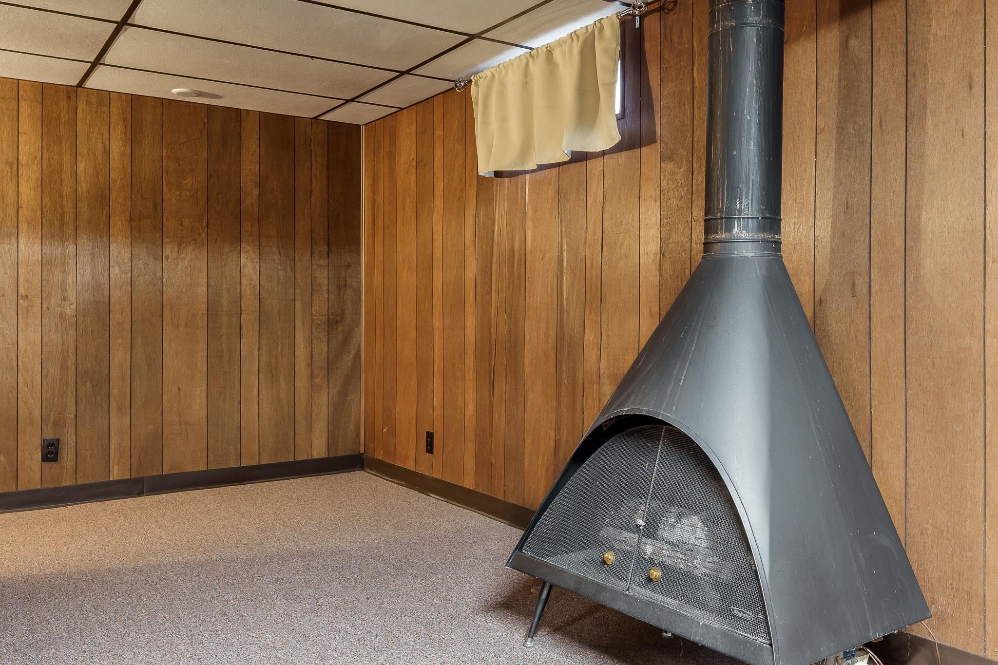3332 Wesleyan Avenue Rockford, IL 61108 - Photo 32 of 45 a view of a door and wooden walls