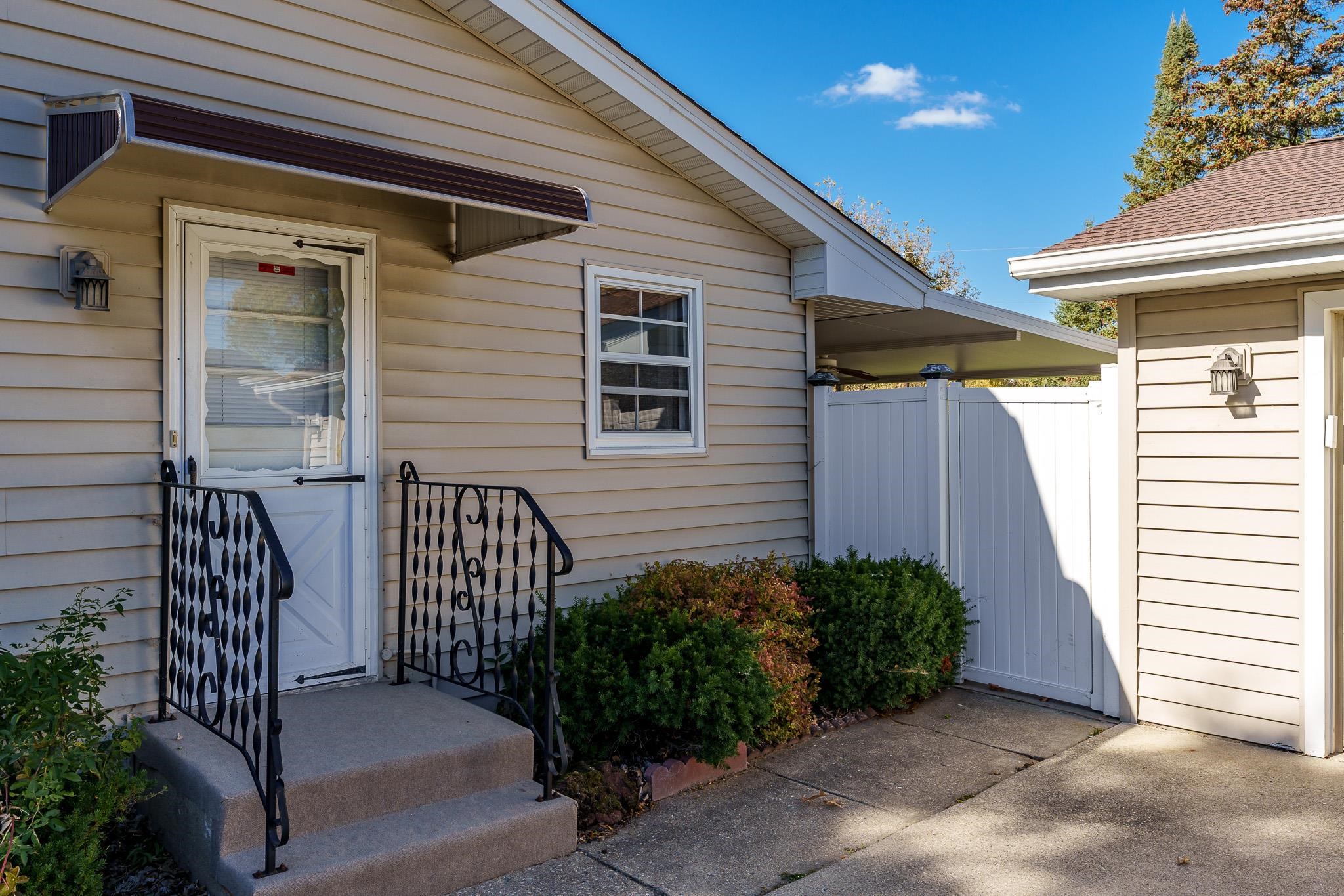 3332 Wesleyan Avenue Rockford, IL 61108 - Photo 36 of 45 a view of a porch with a bench