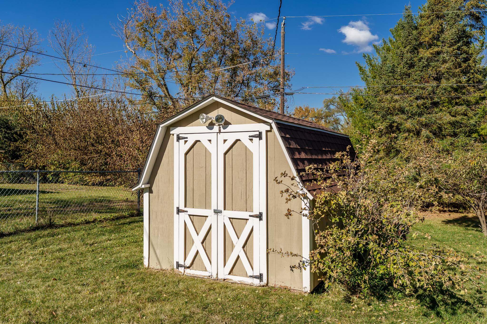 3332 Wesleyan Avenue Rockford, IL 61108 - Photo 43 of 45 a view of a wooden door with a yard
