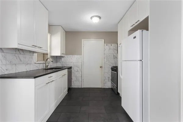 $239,000 | 902 Southwest Lea Drive, Lee's Summit, MO 64081