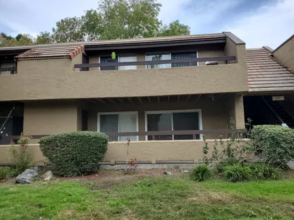 a view of front of a house with a yard