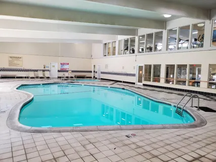 a room with chairs and table