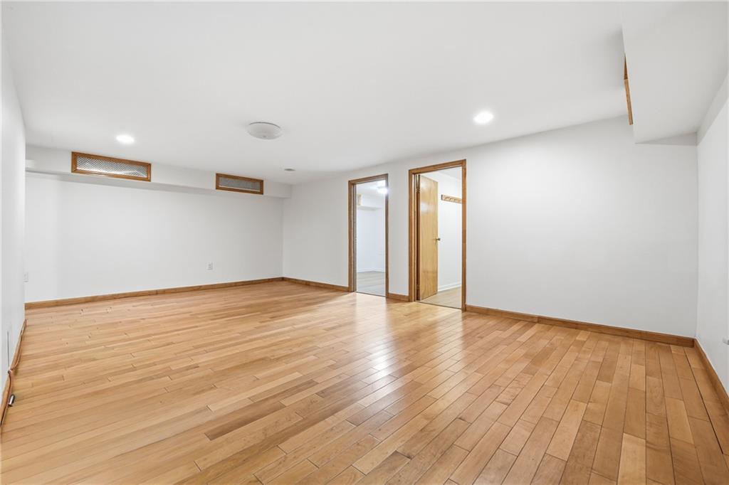 460 North Maple Street Mercer, PA 16137 - Photo 20 of 32 a view of an empty room with wooden floor and a window