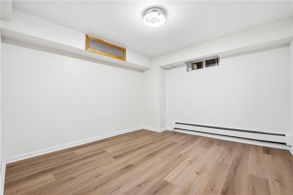 460 North Maple Street Mercer, PA 16137 - Photo 23 of 32 a view of an empty room with wooden floor