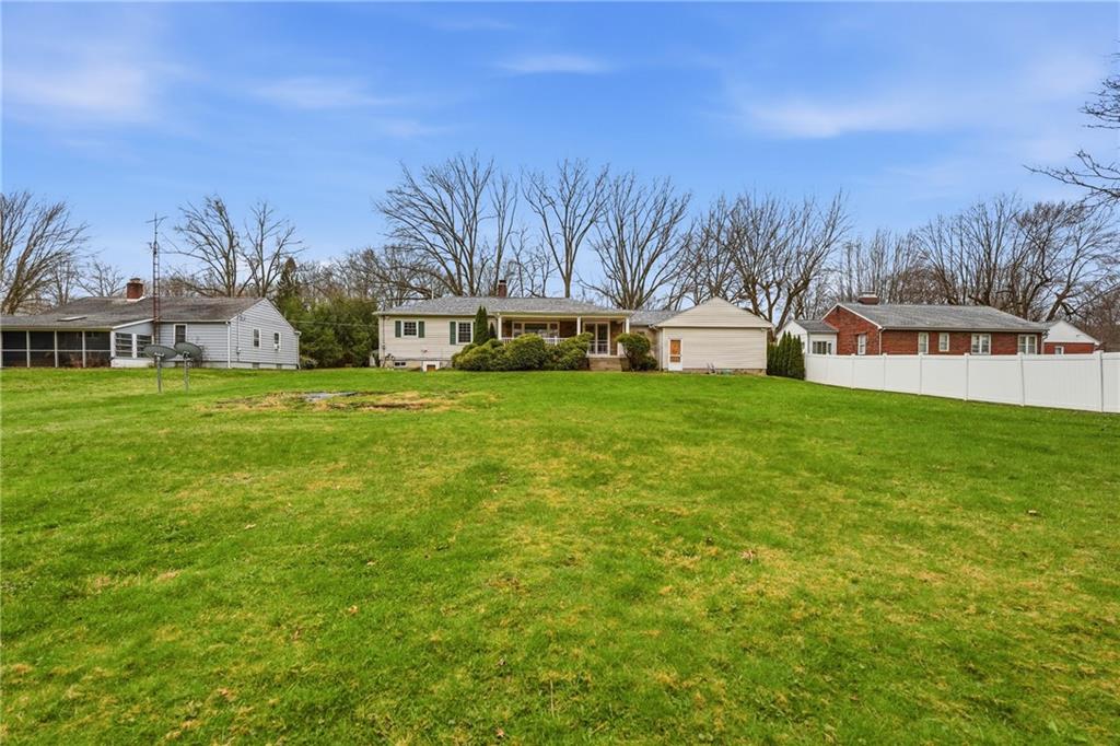 460 North Maple Street Mercer, PA 16137 - Photo 32 of 32 a view of a yard with a house in the background