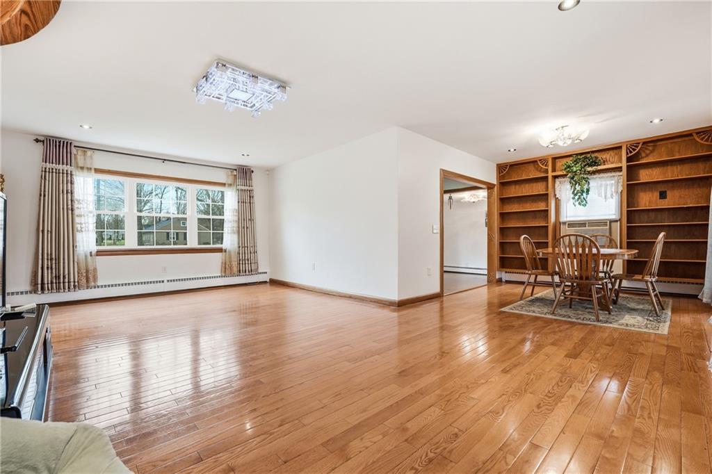 460 North Maple Street Mercer, PA 16137 - Photo 6 of 32 a view of empty room with wooden floor and fan