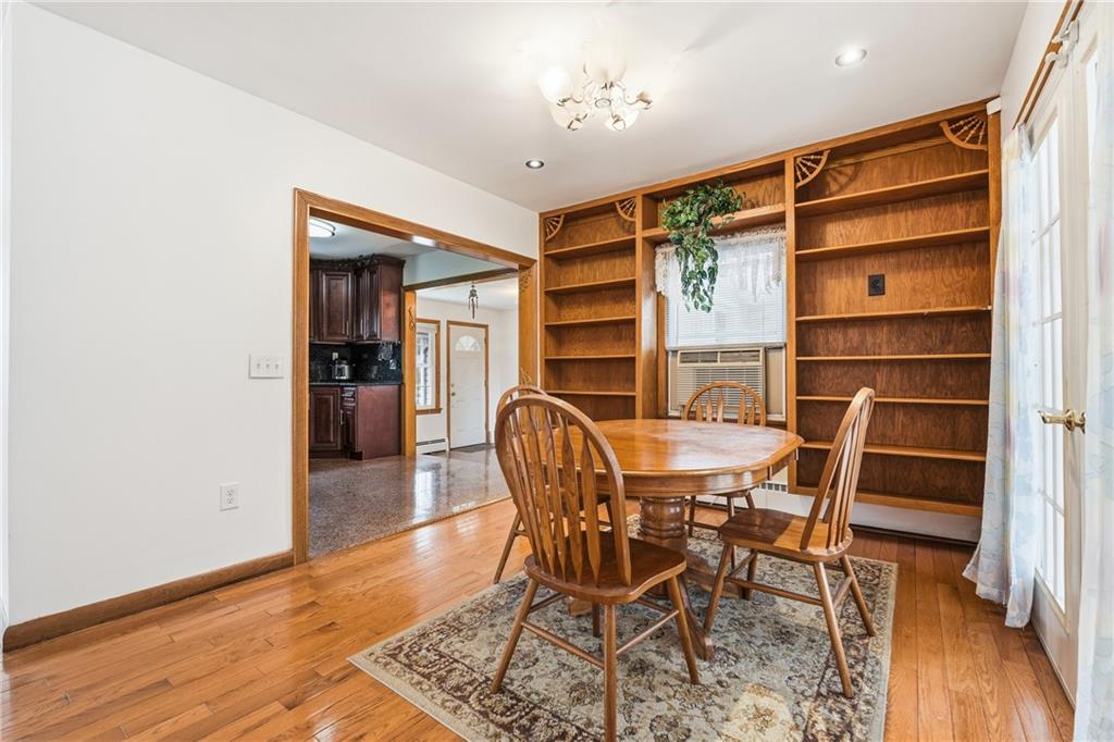 460 North Maple Street Mercer, PA 16137 - Photo 8 of 32 a dining room with furniture and wooden floor