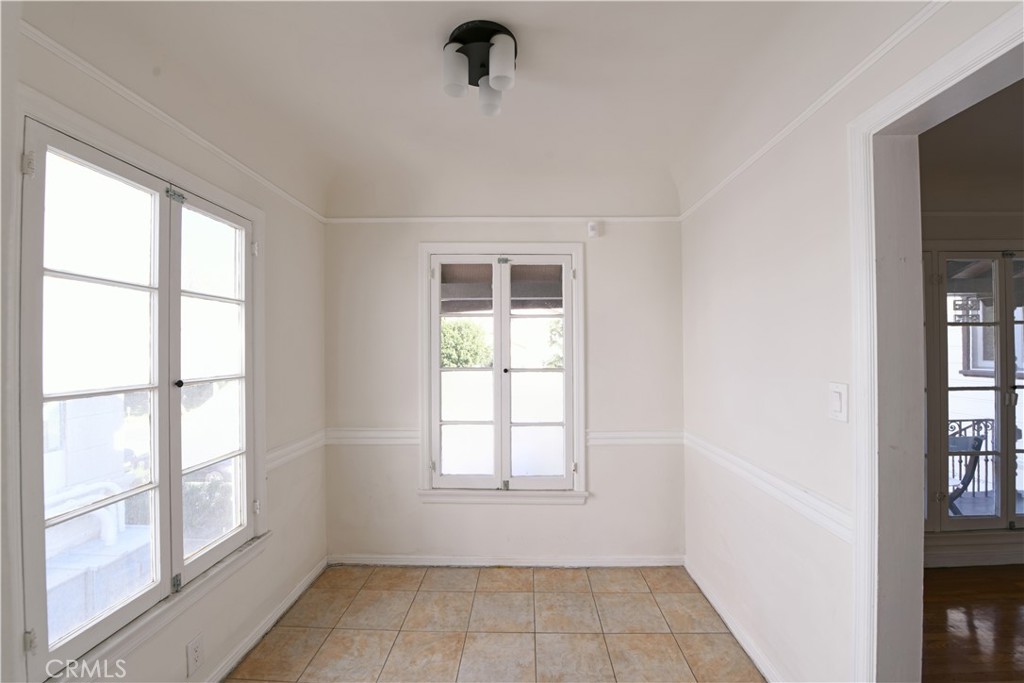 915 Le Doux Road Los Angeles, CA 90035 - Photo 5 of 30 a view of an empty room with a window