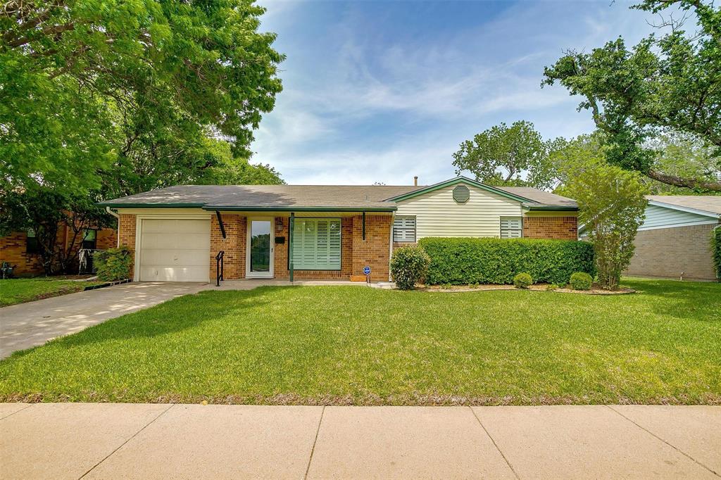 6114 Shadydell Drive Fort Worth, TX 76135 - Photo 1 of 1 front view of a house with a yard