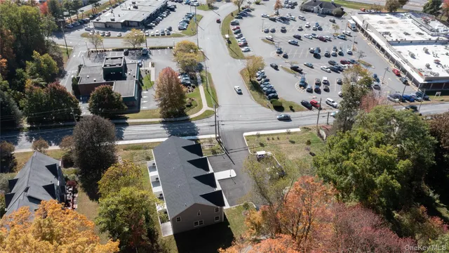 an aerial view of houses with outdoor space
