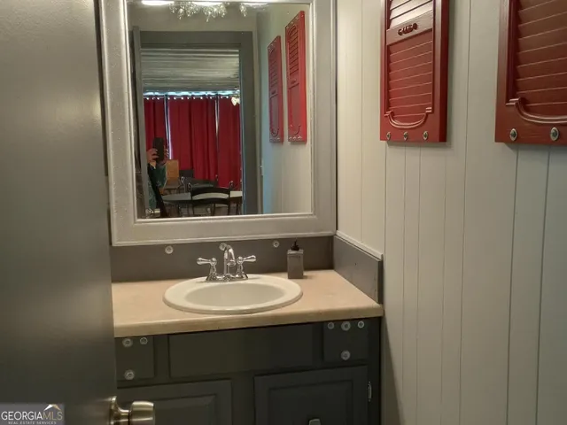 a view of a chairs and table in a patio