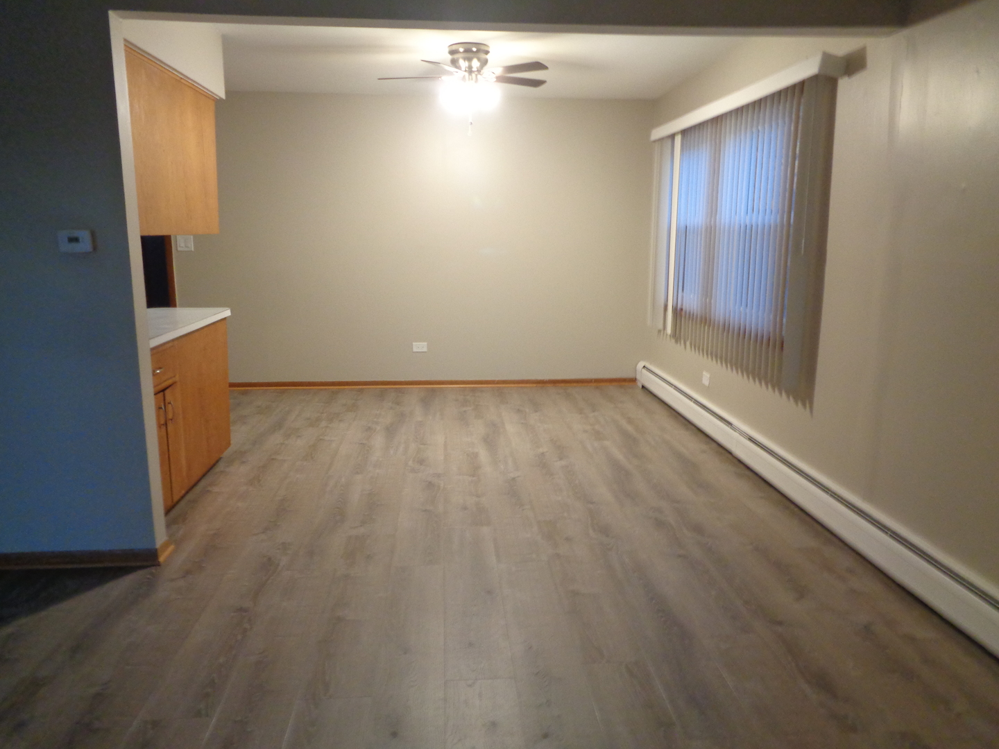 5818 107th Ct Way, Unit 10 Chicago Ridge, IL 60415 - Photo 3 of 7 a view of livingroom with hardwood