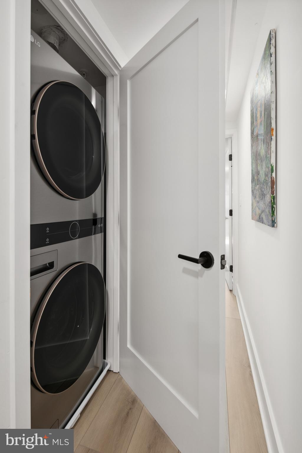 655 Morton Place Northeast, Unit 1 Washington, DC 20002 - Photo 17 of 26 a view of a hallway with washer and dryer