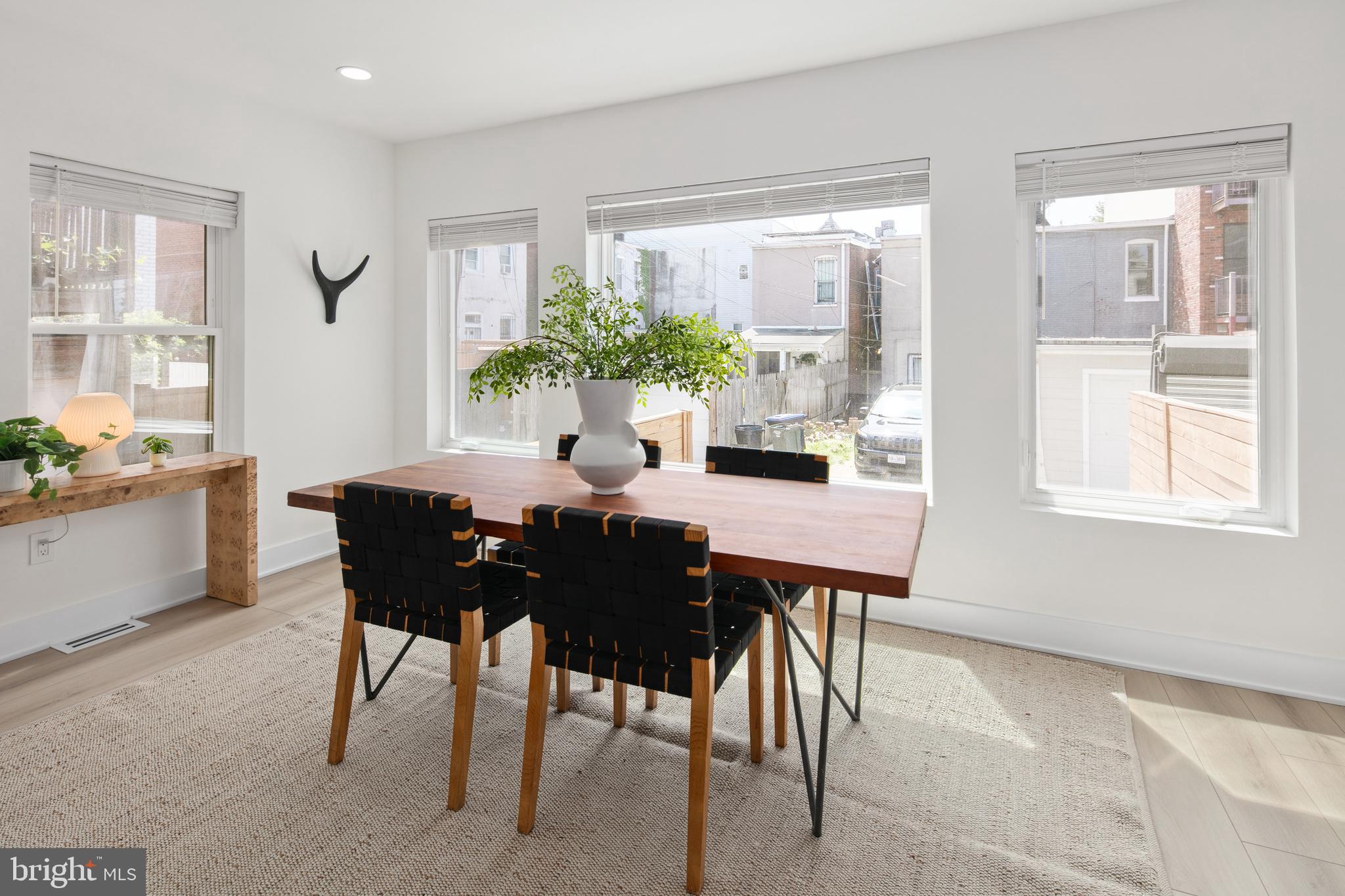655 Morton Place Northeast, Unit 1 Washington, DC 20002 - Photo 10 of 26 a view of a dining room with furniture and window