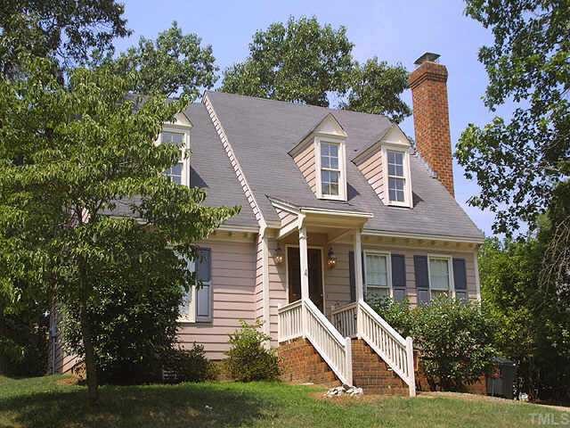 3837 Old Coach Road Raleigh, NC 27616 - Photo 1 of 1 a front view of a house with a yard and garage