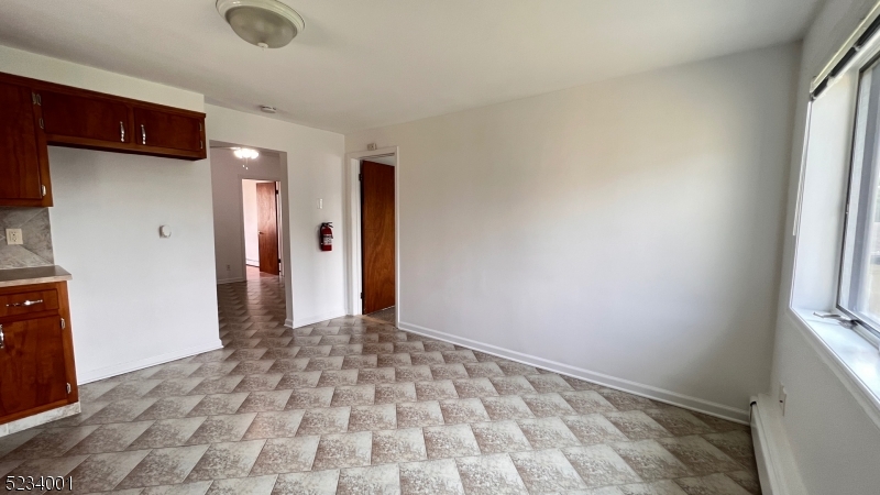 74 Mill Street Bloomfield, NJ 07003 - Photo 1 of 10 a view of an empty room