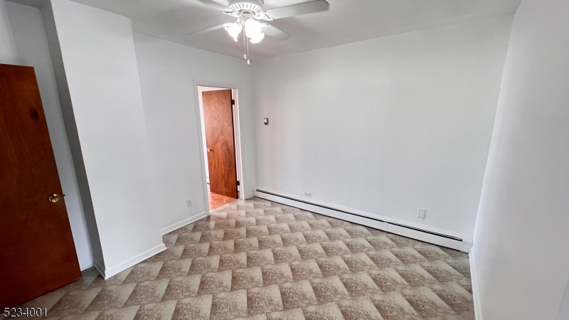 74 Mill Street Bloomfield, NJ 07003 - Photo 5 of 10 a view of an empty room