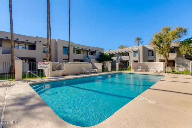 a view of a house with a swimming pool