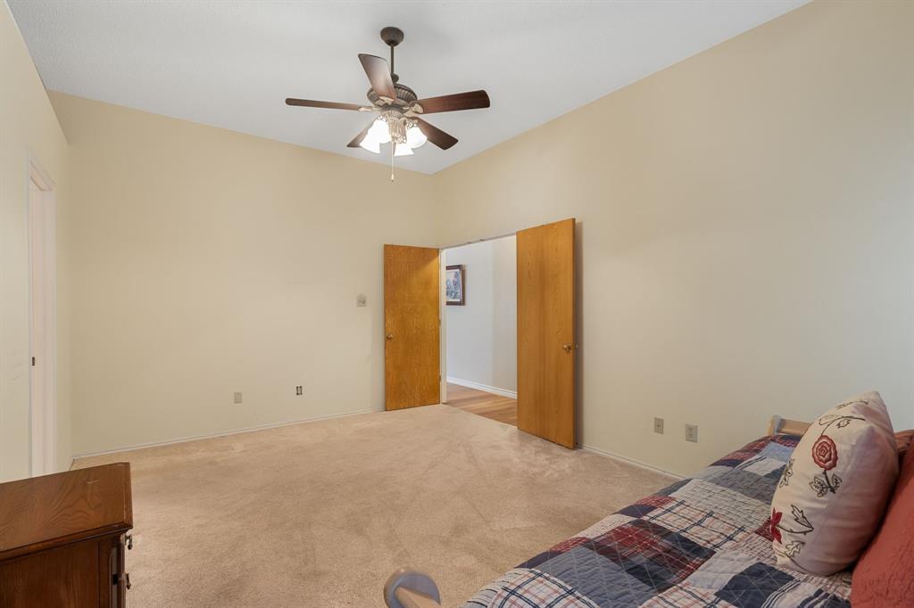 2708 Whitby Lane Grapevine, TX 76051 - Photo 17 of 32 a view of a room with window and ceiling fan