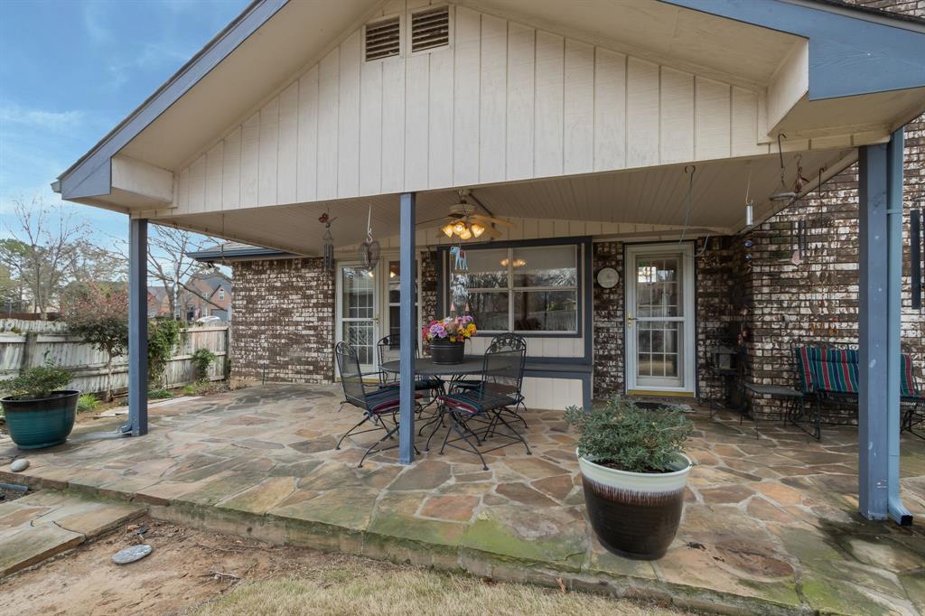 2708 Whitby Lane Grapevine, TX 76051 - Photo 27 of 32 a view of a patio with table and chairs potted plants
