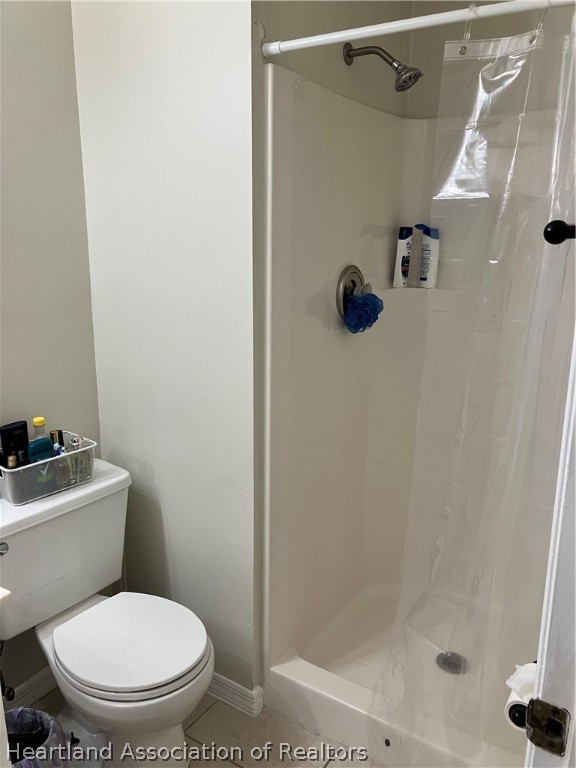 4010 Leaf Road Sebring, FL 33875 - Photo 15 of 35 a bathroom with a toilet and a shower