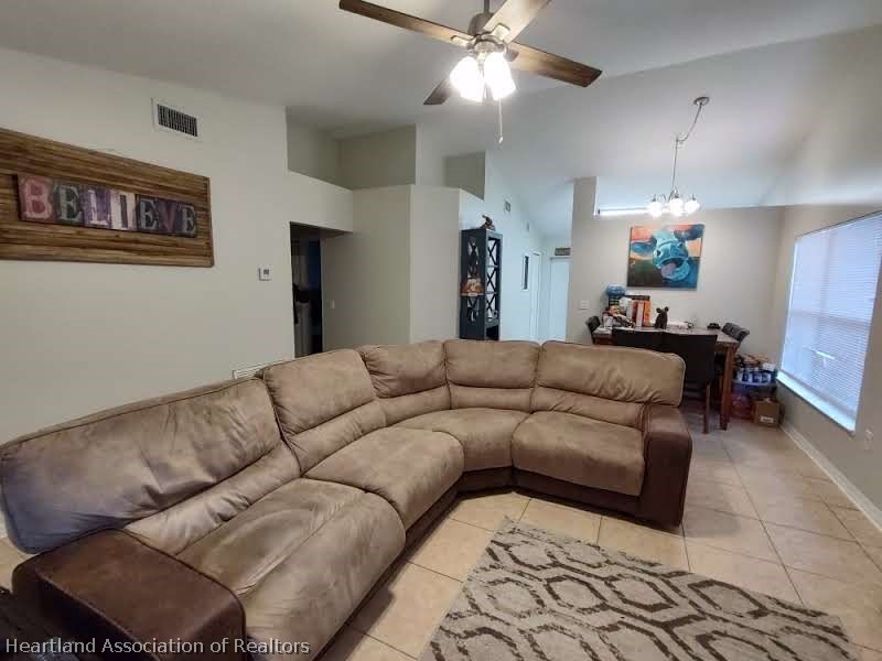 4010 Leaf Road Sebring, FL 33875 - Photo 21 of 35 a living room with furniture and a ceiling fan