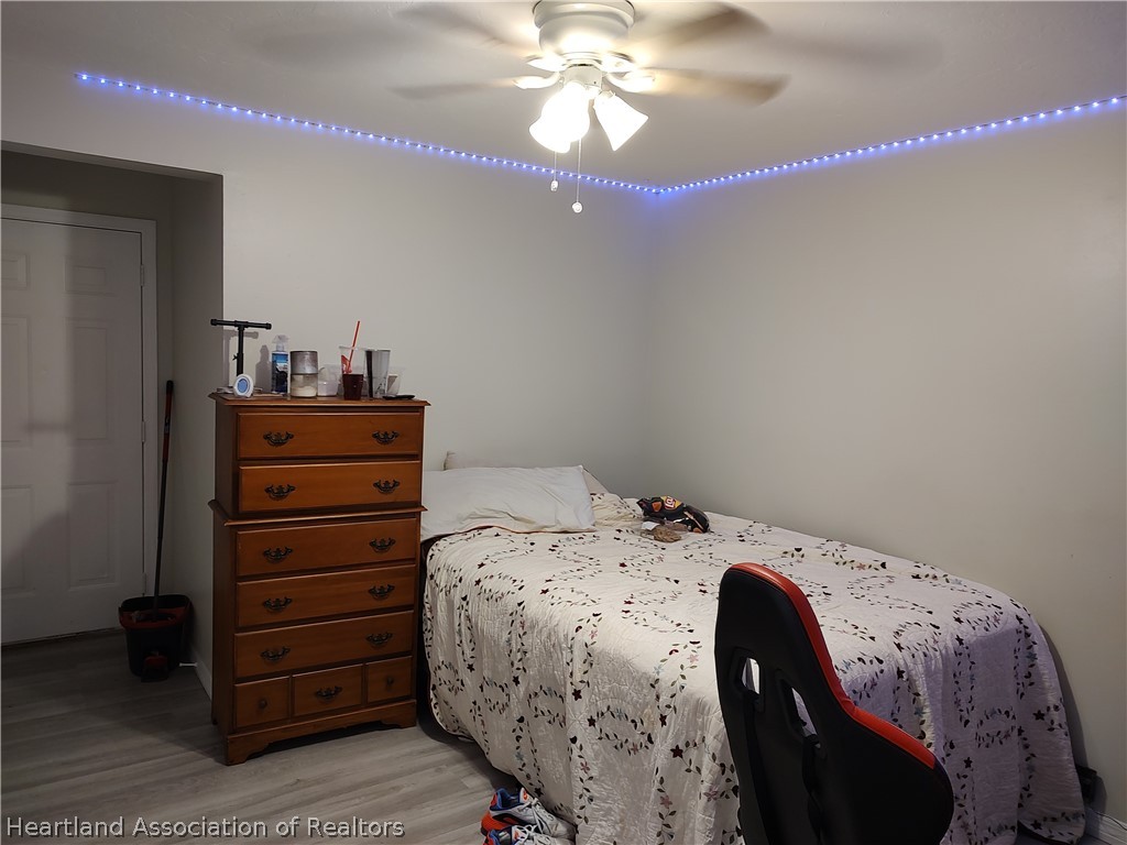 4010 Leaf Road Sebring, FL 33875 - Photo 22 of 35 a bedroom with a bed and a dresser