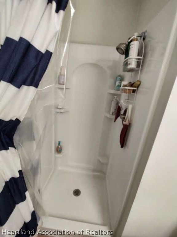 4010 Leaf Road Sebring, FL 33875 - Photo 28 of 35 a bathroom with a shower