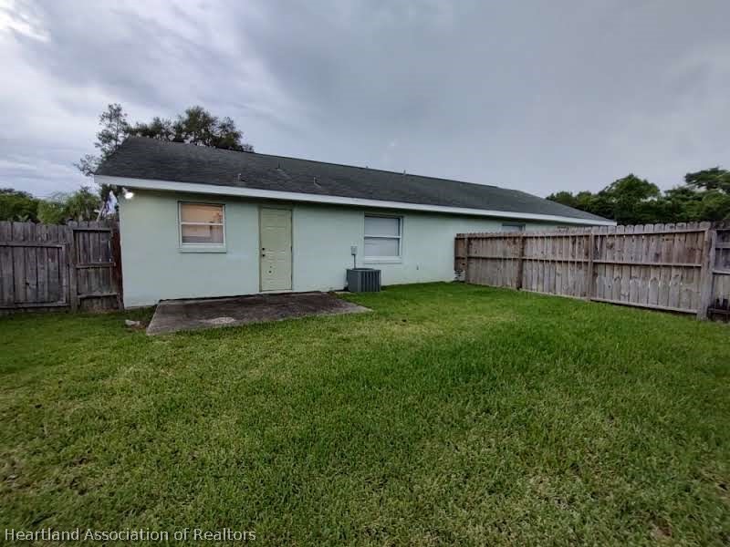 4010 Leaf Road Sebring, FL 33875 - Photo 33 of 35 a backyard of a house with lots of green space