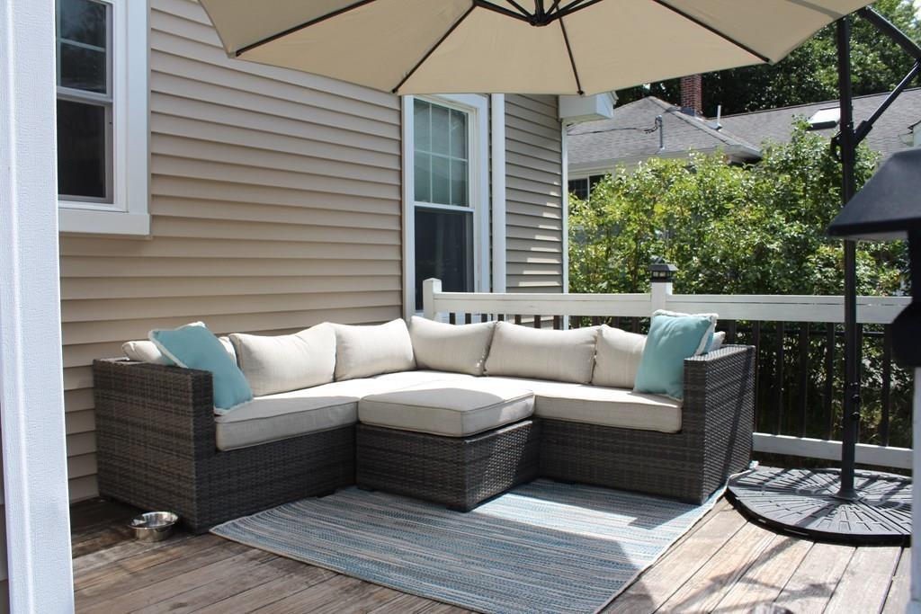 33 Riverside Drive North Reading, MA 01864 - Photo 31 of 37 a building outdoor space with patio furniture