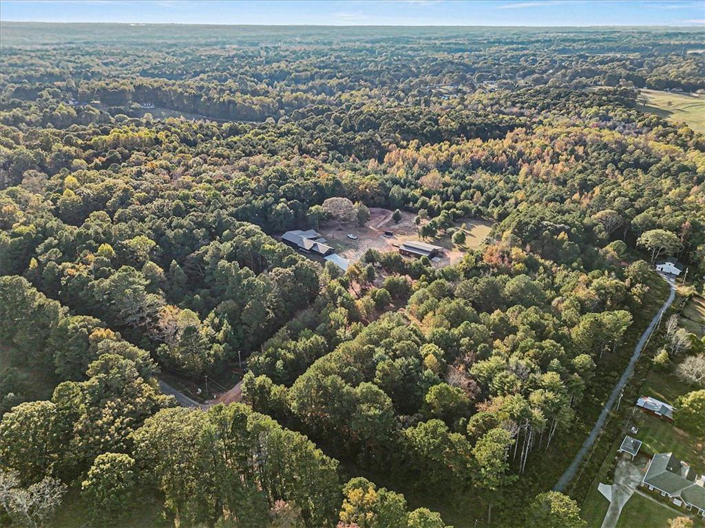 280 Etheridge Road Auburn, GA 30011 - Photo 3 of 7 an aerial view of house with yard and mountain in the background