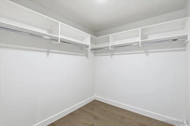 a view of an empty walk in closet