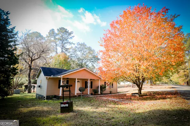front view of a house with a small yard