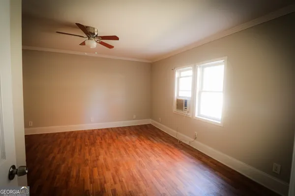 a view of entryway with wooden floor