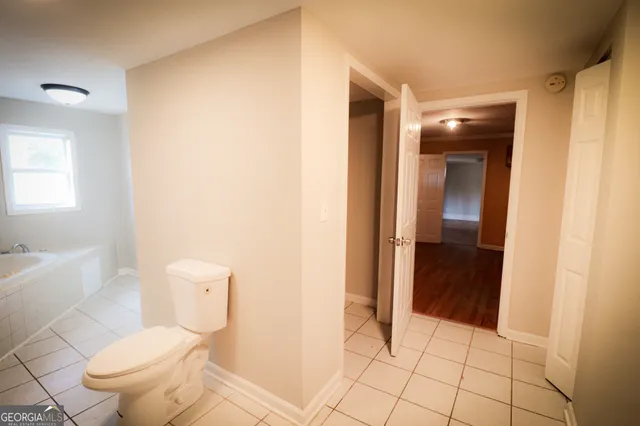 a view of a park with large tree