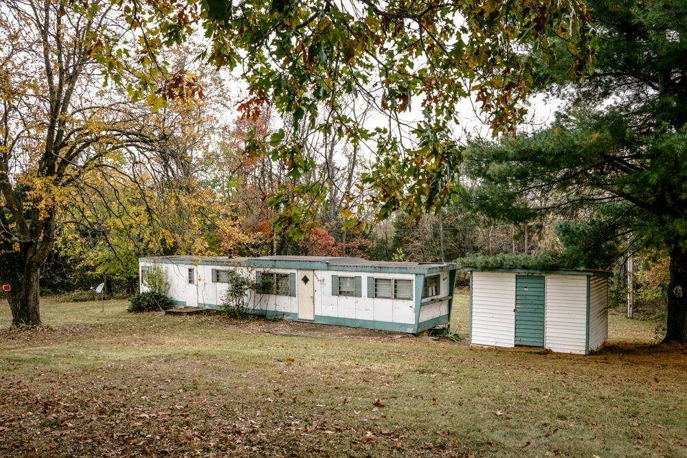 1320 Smithland Road Harrisonburg, VA 22802 - Photo 9 of 12 a front view of a house with a garden