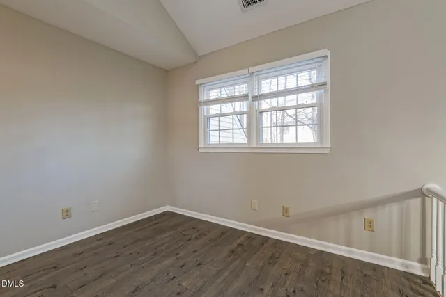 a kitchen with stainless steel appliances granite countertop a sink stove and microwave