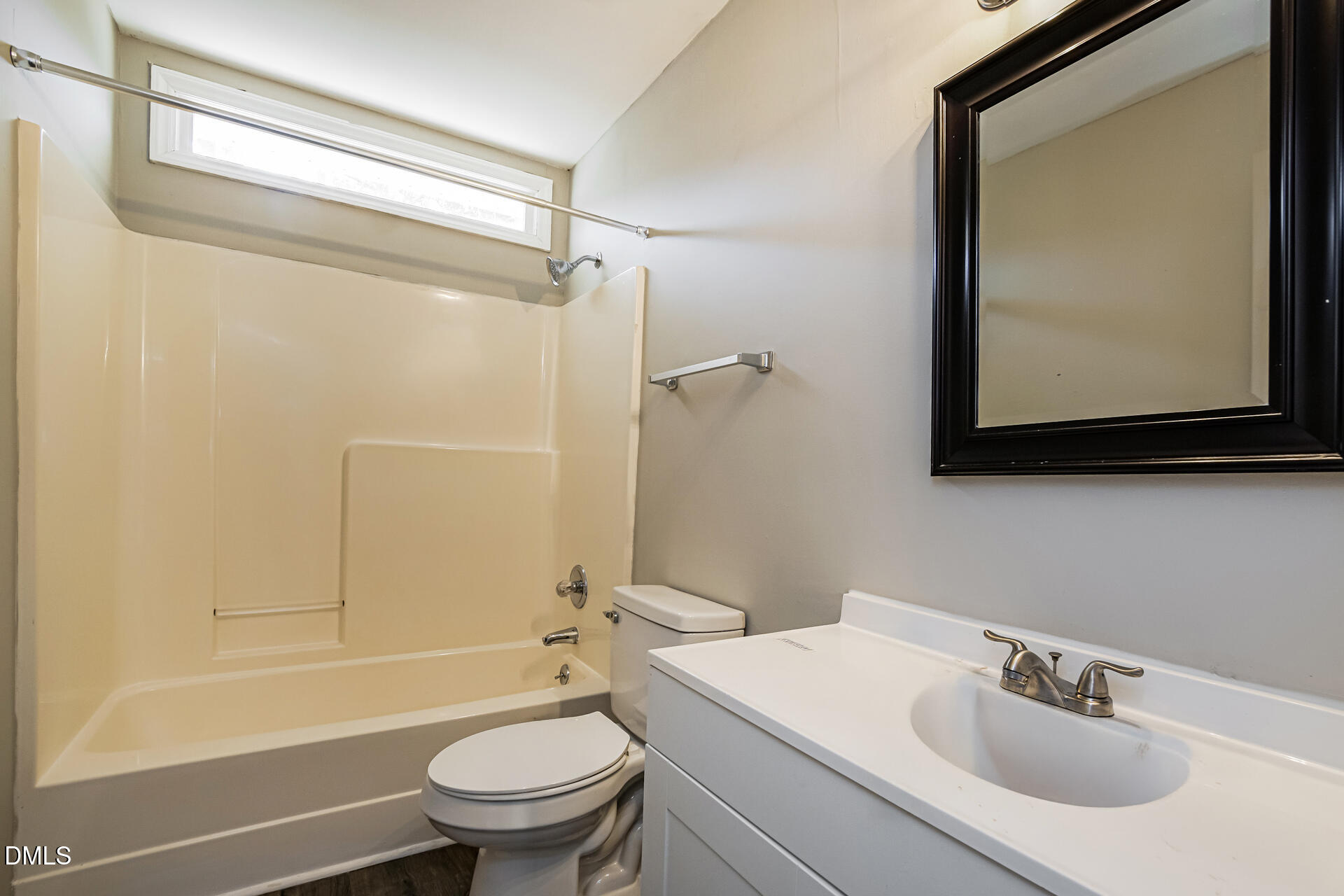 1909 Kushima Court Raleigh, NC 27604 - Photo 19 of 24 a bathroom with a sink toilet and shower