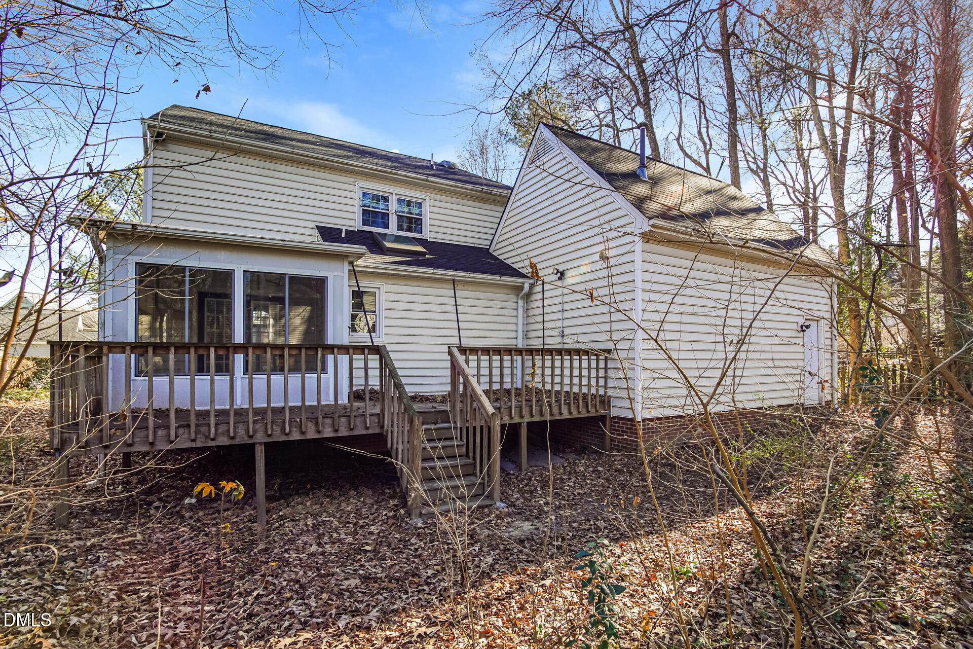 1909 Kushima Court Raleigh, NC 27604 - Photo 20 of 24 a view of a house with a yard and deck