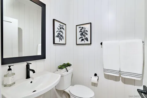 a bathroom with a sink and toilet