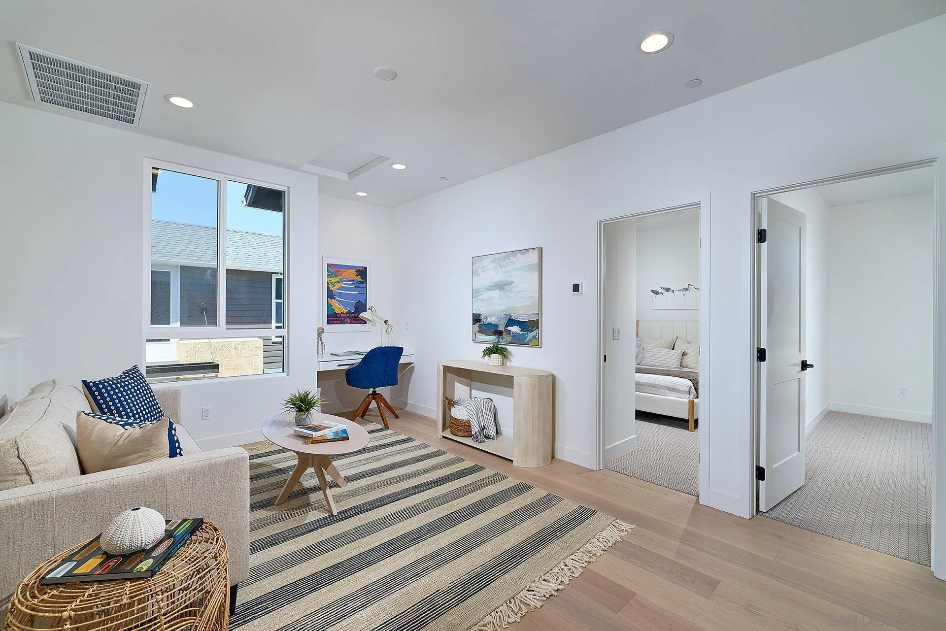 557 North Vulcan Avenue Encinitas, CA 92024 - Photo 10 of 27 a living room with furniture and a table