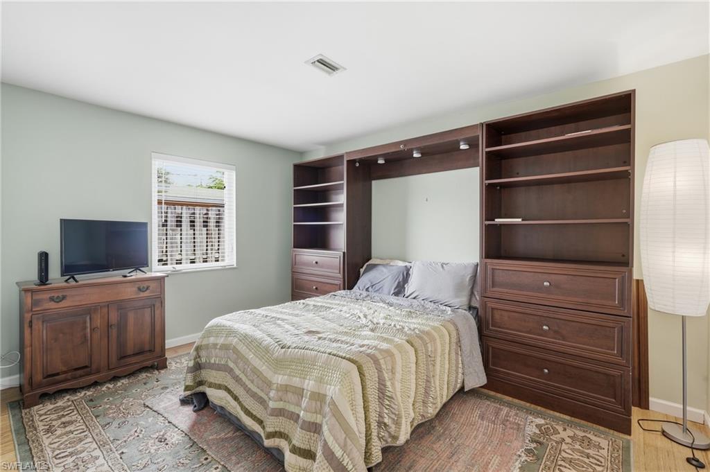 1316 Rordon Avenue Naples, FL 34103 - Photo 24 of 38 Built-in wall unit featuring recessed lighting, integrated shelving, and drawer storage