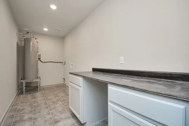 a view of cabinets and outdoor space with wooden floor